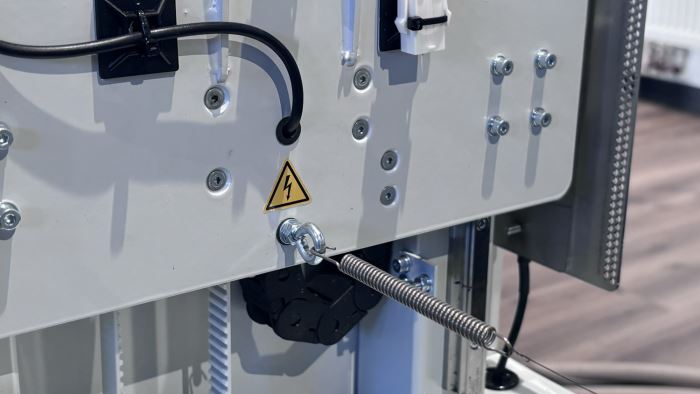 Spring holder and wire tension on CNC hot wire machine
