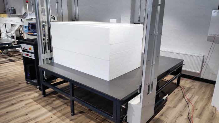 EPS standard block on the machine table of a CNC hot wire machine